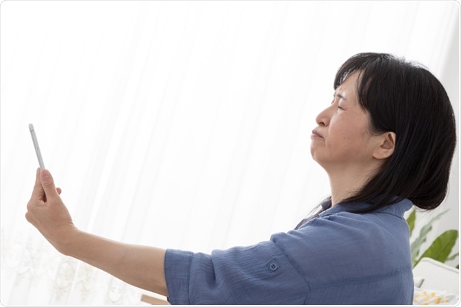 Presbyopia. Image Credit: Aijiro / Shutterstock