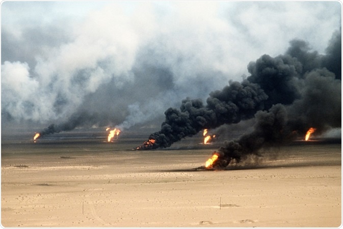 Oil well fires rage outside Kuwait City in the aftermath of the First Gulf War. Retreating Iraqi troops set fire to Kuwait