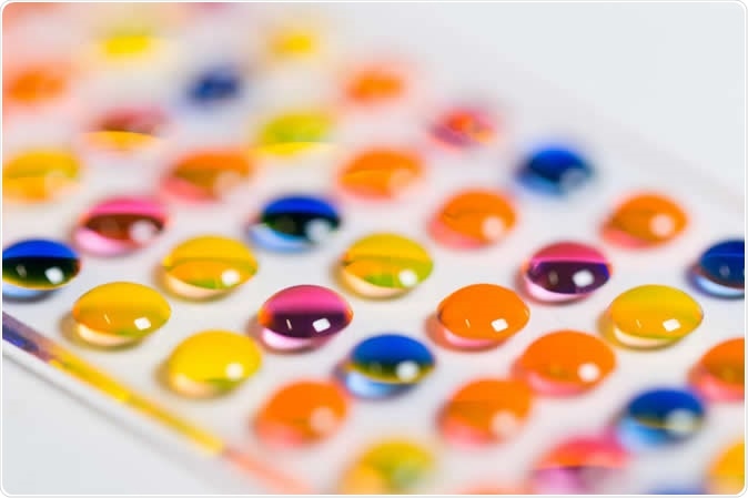 Array of microdroplets with various reactants on the chemBIOS chip-based synthesis platform. Image Credit: Maximilian Benz, KIT