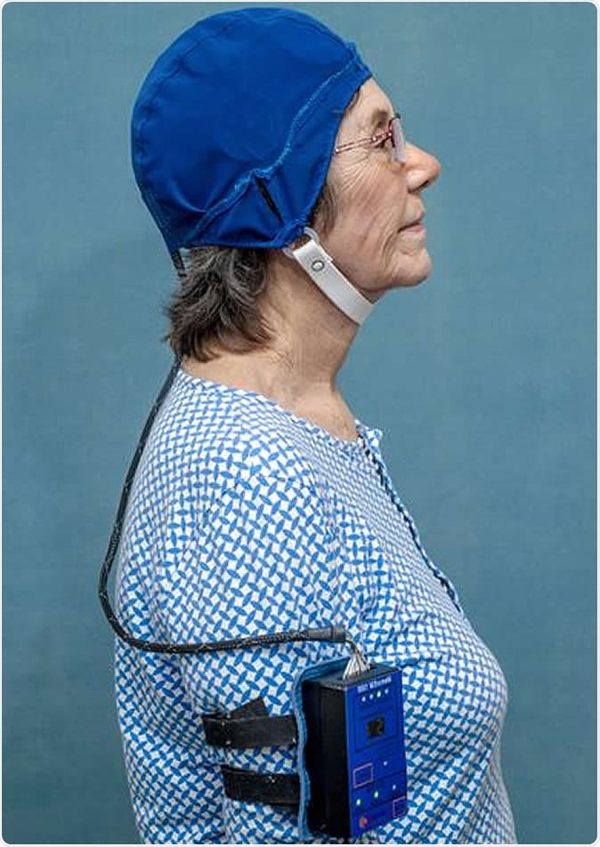 Patient wearing MemorEM. Credit: NeuroEM Therapeutics, Inc.
