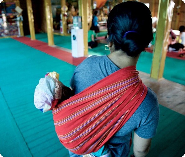 Baby swaddled at treatment center