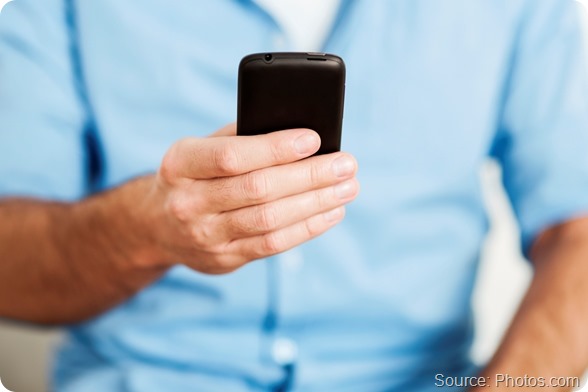 Man using smart phone