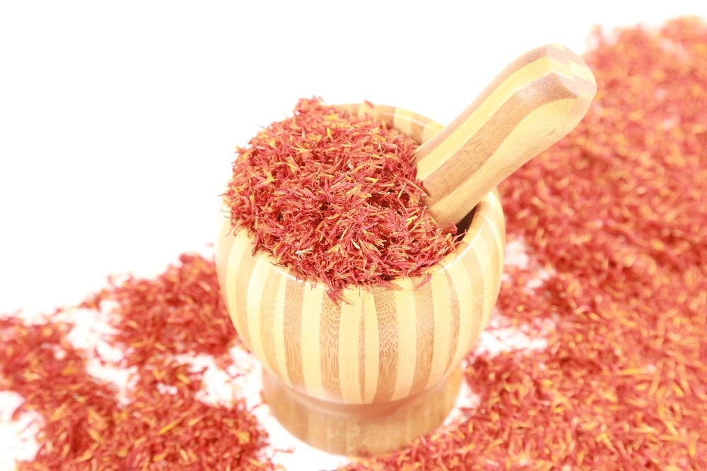 Study: Honghua extract mediated potent inhibition of COVID-19 host cell pathways. Image Credit: Jiang Zhongyan/Shutterstock