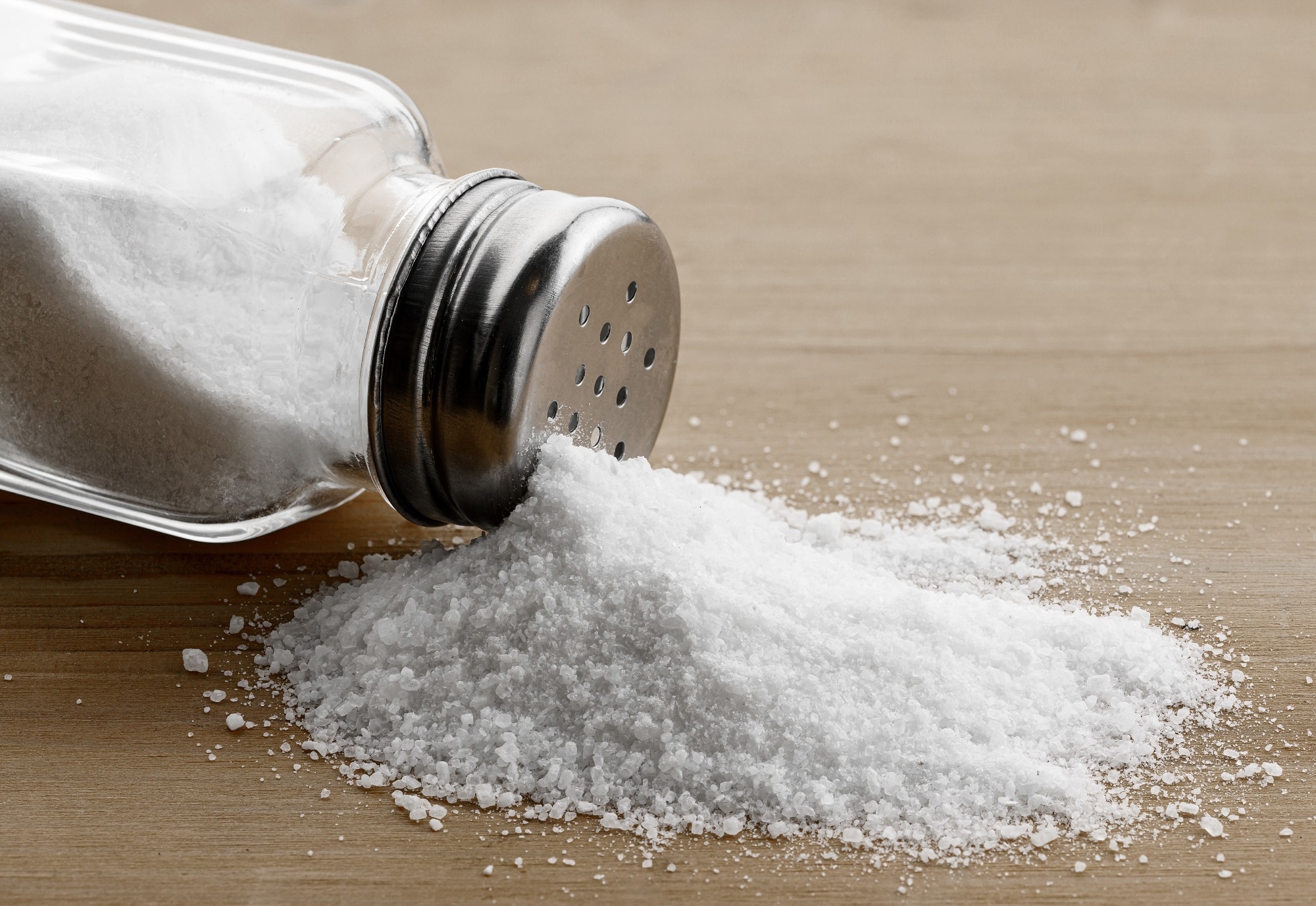 Study: Adding salt to food at table as an indicator of gastric cancer risk among adults: a prospective study. Image Credit: Soho A Studio/Shutterstock.com