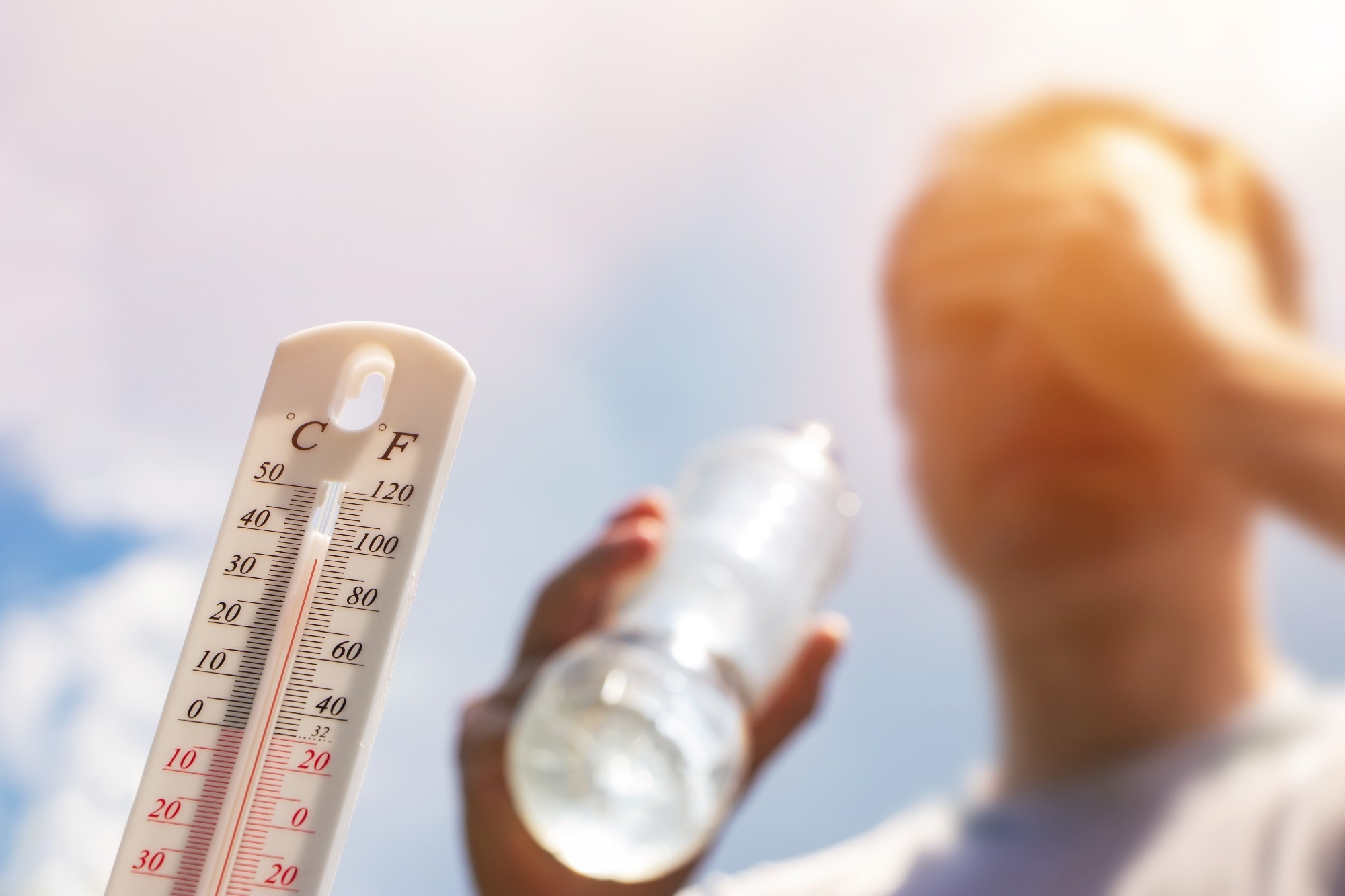 Man drinking water in extreme heat